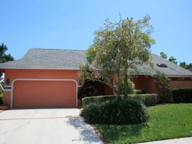 Exterior view of home with garage