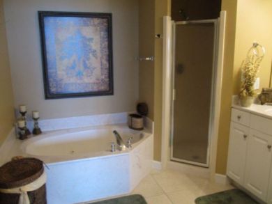 Sample whirlpool tub & walk-in shower in master bathroom