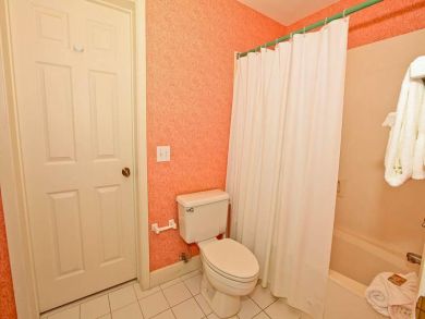Bathroom with shower in tub