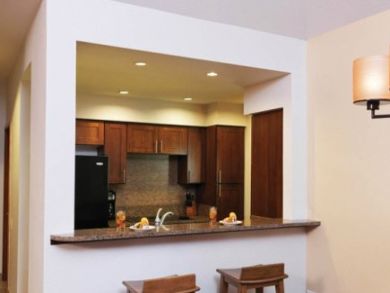 Full kitchen with breakfast bar Full kitchen with breakfast bar