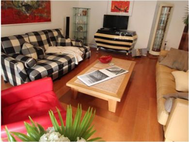 Living room with flat screen TV Living room with flat screen TV