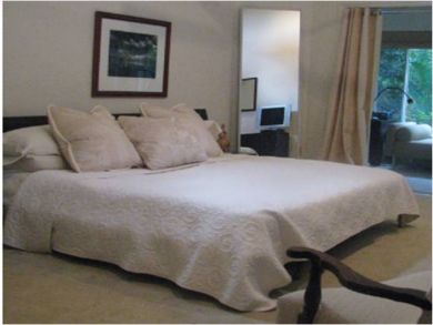 Master bedroom with king bed Master bedroom with king bed