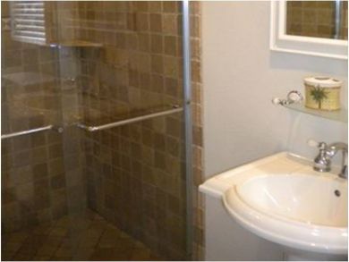 Bathroom with walk-in shower Bathroom with walk-in shower