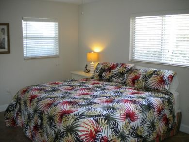 Master bedroom with king bed Master bedroom with king bed