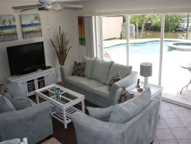 Comfortable living room with flat screen TV Comfortable living room with flat screen TV