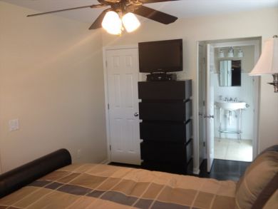 Master bedroom with flat screen TV