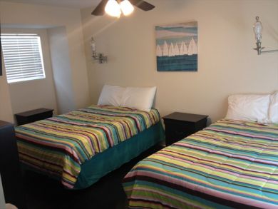 Bedroom 2 with two full beds
