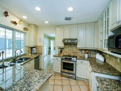 Canal Front Home with Caged Pool in Sanibel, Walk to Beach