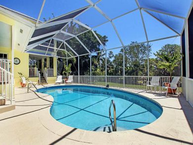 Canal Front Home with Caged Pool in Sanibel, Walk to Beach