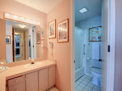 Ensuite bathroom with shower in tub