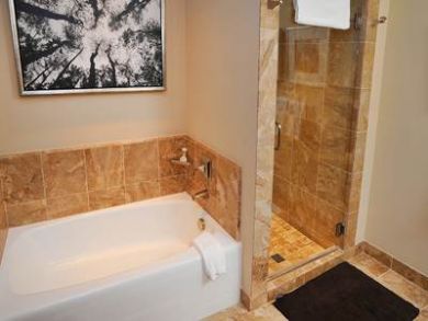 Bathroom with tub & walk-in shower Bathroom with tub & walk-in shower