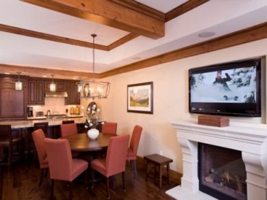 Dining area with flat screen TV & fireplace