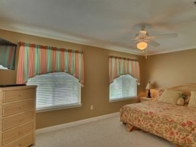 Master bedroom with king bed Master bedroom with king bed