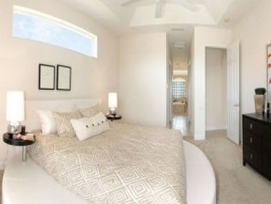 Master bedroom with king bed Master bedroom with king bed