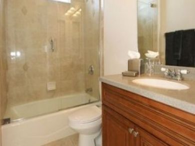 Bathroom with shower in tub Bathroom with shower in tub