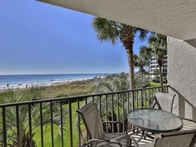 Beach view balcony with table set