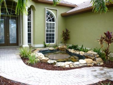 Entry with pond
