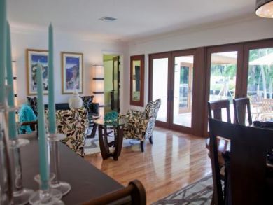 Dining area with swimming pool view
