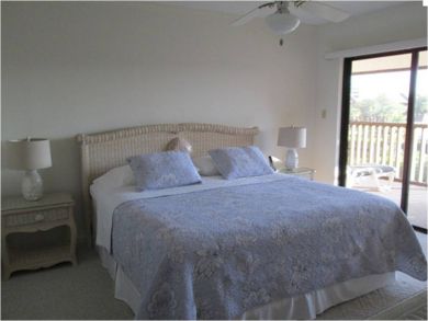 Master bedroom with king bed Master bedroom with king bed
