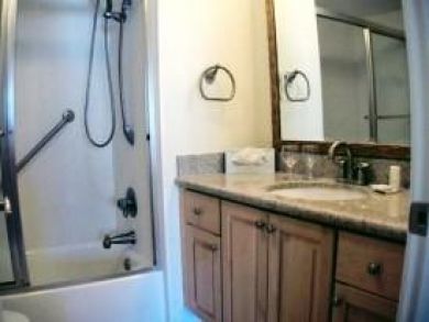 Bathroom with shower in tub