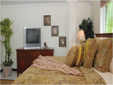 Master bedroom with king bed Master bedroom with king bed