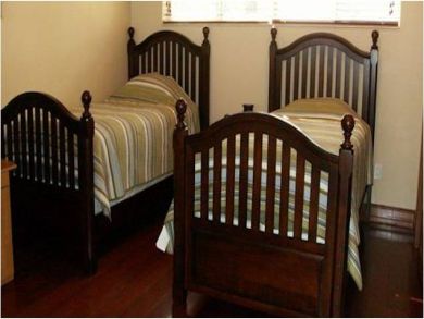 One set of twin beds in bedroom 3