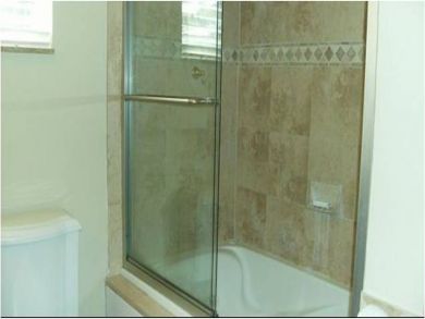 Bathroom with shower in tub