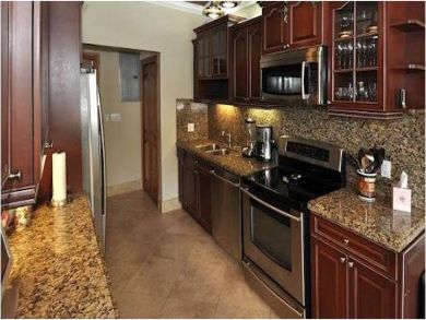 Full kitchen with granite counter tops