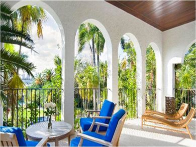 Balcony with table set & lounging chairs