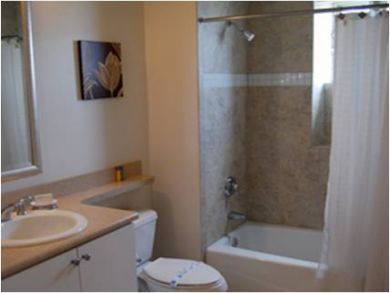 Bathroom with shower in tub
