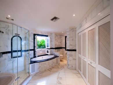 Bathroom with tub and shower