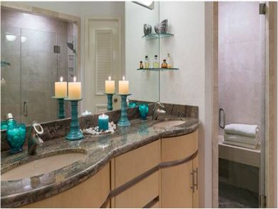 Bathroom with dual vanity and sauna