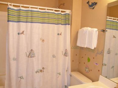 Bathroom with shower in tub