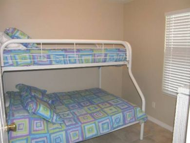 Guest bedroom with one set of bunk beds Guest bedroom with one set of bunk beds