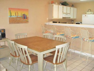 Kitchen with breakfast bar & dining area Kitchen with breakfast bar & dining area