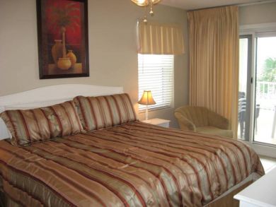 Master bedroom with king bed Master bedroom with king bed