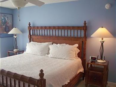 Master bedroom with king bed Master bedroom with king bed