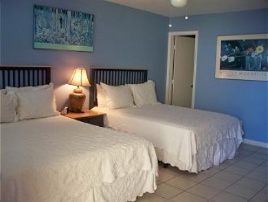 Bedroom 3 with two queen beds Bedroom 3 with two queen beds