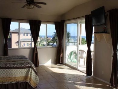 Master bedroom with queen bed