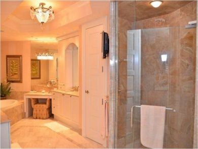 Bathroom with tub and shower