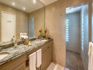 Bathroom with walk-in shower & two sinks Bathroom with walk-in shower & two sinks