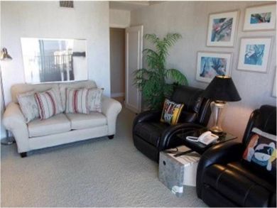 Den with seating area