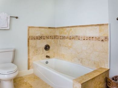 Separate shower and tub in master bathroom