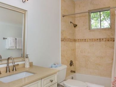 Bathroom with shower in tub