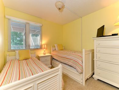 Bedroom 2 has two twin beds & trundle