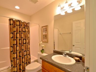 Bathroom with shower in tub