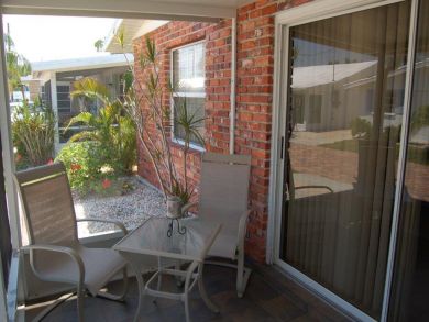 Screened Porch with Outdoor Furniture