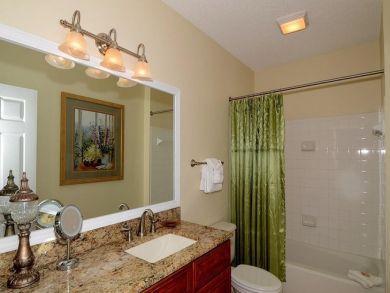 Bathroom with shower in tub