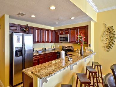 Fully equipped kitchen with breakfast bar