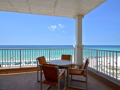 Spacious balcony with outdoor furniture